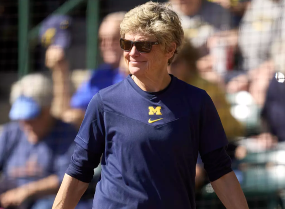 Carol Hutchins in blue Michigan shirt
